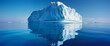 A panoramic view of an iceberg floating in the ocean