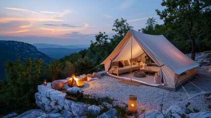 Wall Mural - Glamping in the mountains with fireplace and breathtaking views of nature, luxury tent with a beautiful sofa, country hotel in the forest at dusk. 