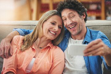 Poster - Couple, selfie and sofa in home, smile and excited for memory with bonding for love with connection. People, man and woman with embrace for care, happy and profile picture on app for social network