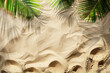 Close up of palm leaf on the golden wavy sand with copy space