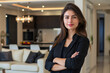 portrait of successful female real estate agent in modern flat