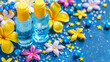 Two bottles of blue liquid are on a blue background with flowers and stars