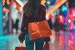 unrecognizable woman in casual clothing carrying shopping bags in spacious modern mall with bright lights consumerism concept photography