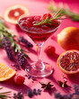 Alcohol cocktail with lavender, grapefruit and rosemary on pink background