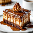A delicious-looking slice of cake with chocolate frosting and caramel drizzle, placed on a white plate.