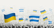 People waving flag of Honduras and Ukraine, symbolizing Honduras solidarity for Ukraine.