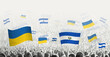 People waving flag of El Salvador and Ukraine, symbolizing El Salvador solidarity for Ukraine.