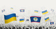 People waving flag of Belize and Ukraine, symbolizing Belize solidarity for Ukraine.