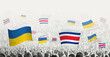 People waving flag of Costa Rica and Ukraine, symbolizing Costa Rica solidarity for Ukraine.