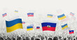 People waving flag of Haiti and Ukraine, symbolizing Haiti solidarity for Ukraine.