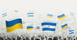 People waving flag of Nicaragua and Ukraine, symbolizing Nicaragua solidarity for Ukraine.