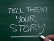 Tell your story, word text written on chalkboard, motivational inspirational quote