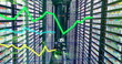 Green, yellow and blue graphs processing data over computer server room