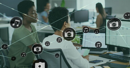 Poster - Image of connected icons over diverse female coworkers discussing reports on computer