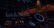 Image of financial graphs and data over buildings at night