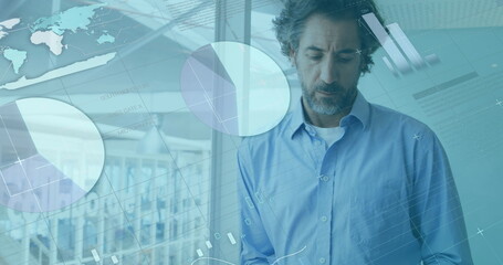 Poster - Caucasian middle-aged man in blue shirt analyzing digital graphs