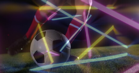 Poster - Image of neon shapes over caucasian football player kicking ball at stadium