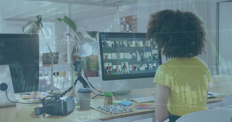 Poster - Image of financial data processing over biracial businesswoman working in office