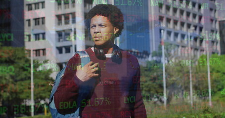 Poster - Image of trading board and numbers over african american man standing and looking time on clock