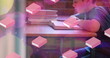 Image of books moving over happy schoolboy reading