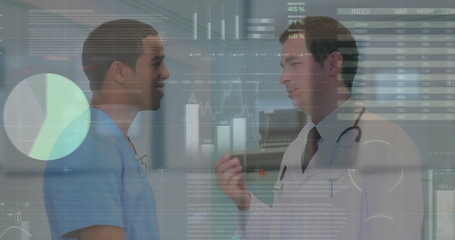 Canvas Print - Image of financial data and graphs over diverse male doctors talking