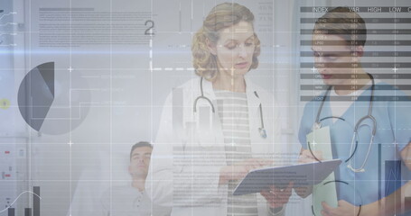 Poster - Image of financial data and graphs over caucasian female and male doctors