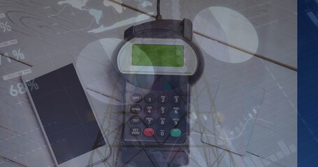Poster - image of graphs over hand of caucasian man holding payment terminal