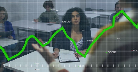 Poster - Image of green graphs moving over african american woman taking notes during a presentation
