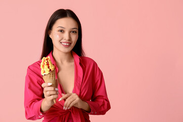 Poster - Beautiful Asian woman with mango ice-cream on pink background