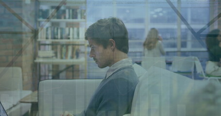 Poster - Image of multiple graphs and leaves over focused caucasian businessman working over laptop