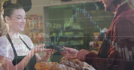Poster - Image of data processing over caucasian man using credit card to make payment at a cafe