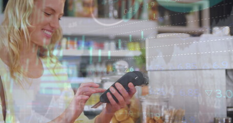 Poster - Image of data processing over caucasian woman using credit card to make payment at cafe