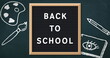 Image of school icons over back to school text on letterboard