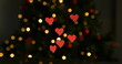 Image of hearts over spots and bubbles