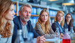 © Gil Macedo - Businessmen and businesswomen in the company at a business meeting.