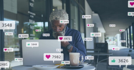 Poster - Image of social media icons and numbers over african american man using laptop