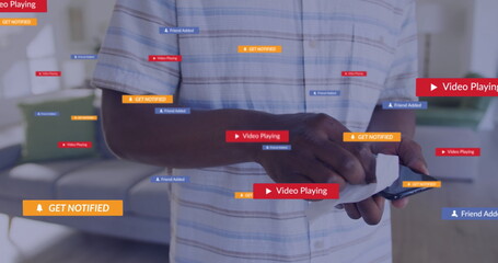 Poster - Image of social media icons with texts over african american man cleaning smartphone