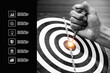 Target bullseye or Bulls eye and hand and red dart arrow throw hitting the center of a shooting with financial business targeting planning growth icons for aim to winner goal of business win concept.