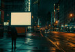 empty billboard in a middle city street at night