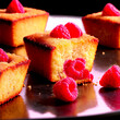 Raspberry financiers golden almond cakes fresh raspberries tumbling Food and Culinary concept