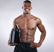 Black man, bodybuilder and jar in portrait for protein, powder or supplements in studio by white background. Person, container and happy with pharma product for healthy body, nutrition and benefits