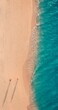 Aerial view amazing beach with couple walking in sunset light close to turquoise sea. Top view of summer beach landscape. Carefree love couple vacation, romantic holiday. Freedom leisure activity