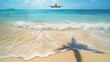 A commercial airplane is captured moments before landing, flying low over a sandy beach with clear blue ocean waters and gentle waves breaking ashore.