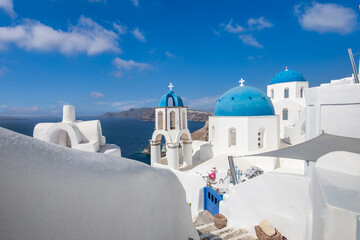 Santorini island, Greece. Picturesque romantic summer landscape on Santorini. Oia village in the morning light. Amazing view with white houses. Island of lovers, vacation and travel tourism background