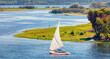 White sailing Felucca sailboats on River Nile, Aswan, Egypt