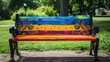 Public park bench painted with vibrant colors