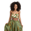 © SuperPixel Inc - Front view mid shot of a beautiful African woman dressed in a green crop top and flowy floral skirt, smiling, isolated on a white transparent background