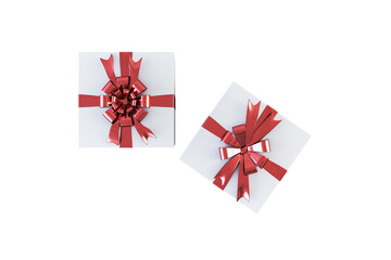 Poster - Two white gift boxes with red ribbons isolated on a white background, depicting the concept of surprise or celebration