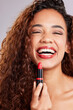 Woman, portrait and red lipstick product or happy for makeup cosmetics, confidence or grey background. Female person, face studio for beauty skin care or wellness facial for laughing, funny or joke