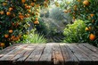 Wooden table on citrus garden background, empty space for product
